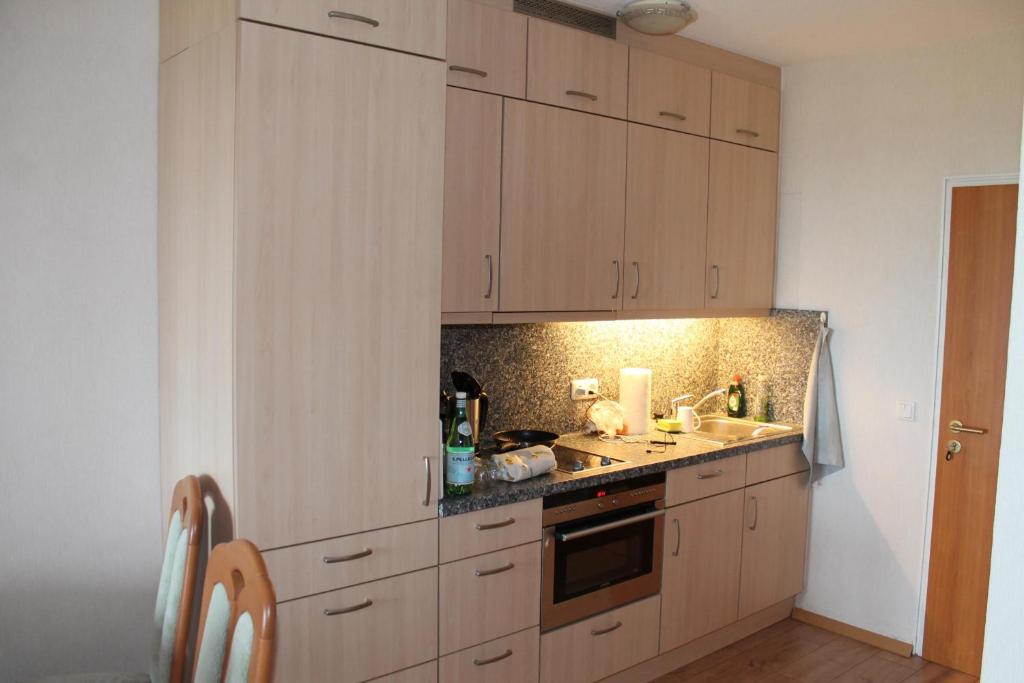 Kuchyň nebo kuchyňský kout v ubytování Ostseeferienwohnung K1317 mit Meerblick