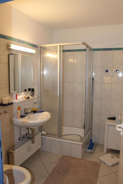 Koupelna v ubytování Ostseeferienwohnung K1317 mit Meerblick