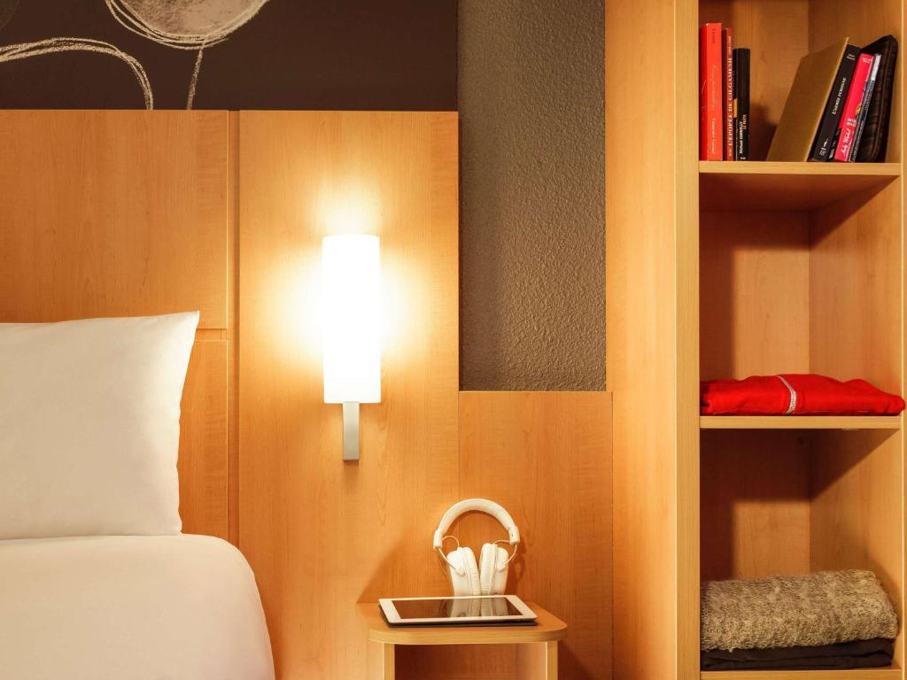 Vuode tai vuoteita majoituspaikassa ibis Asuncion