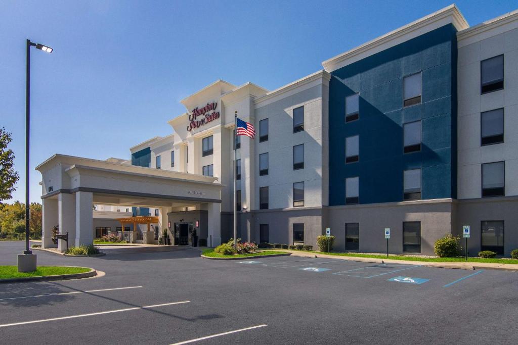 an empty parking lot in front of a hotel at Hampton Inn & Suites Schererville in Schererville