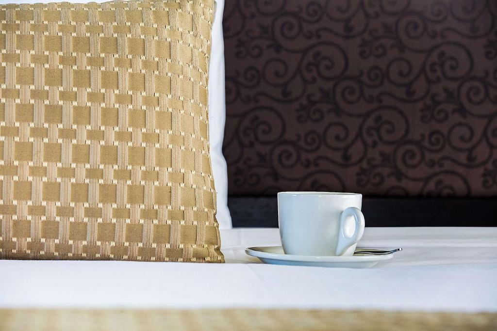 Postel nebo postele na pokoji v ubytování Comfort Inn On Raglan