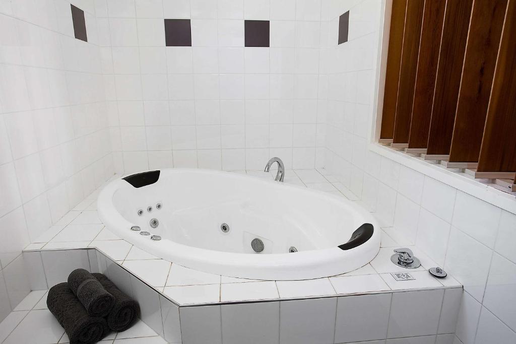 Koupelna v ubytování Comfort Inn On Raglan