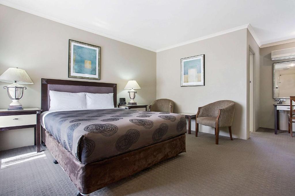 Postel nebo postele na pokoji v ubytování Comfort Inn On Raglan