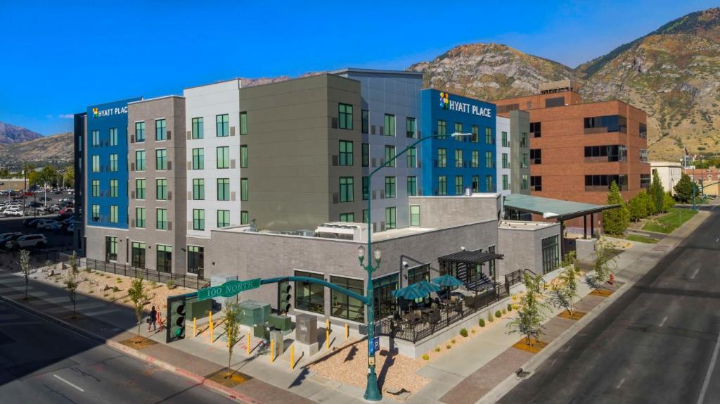 a rendering of a hotel on a city street at Hyatt Place Provo in Provo