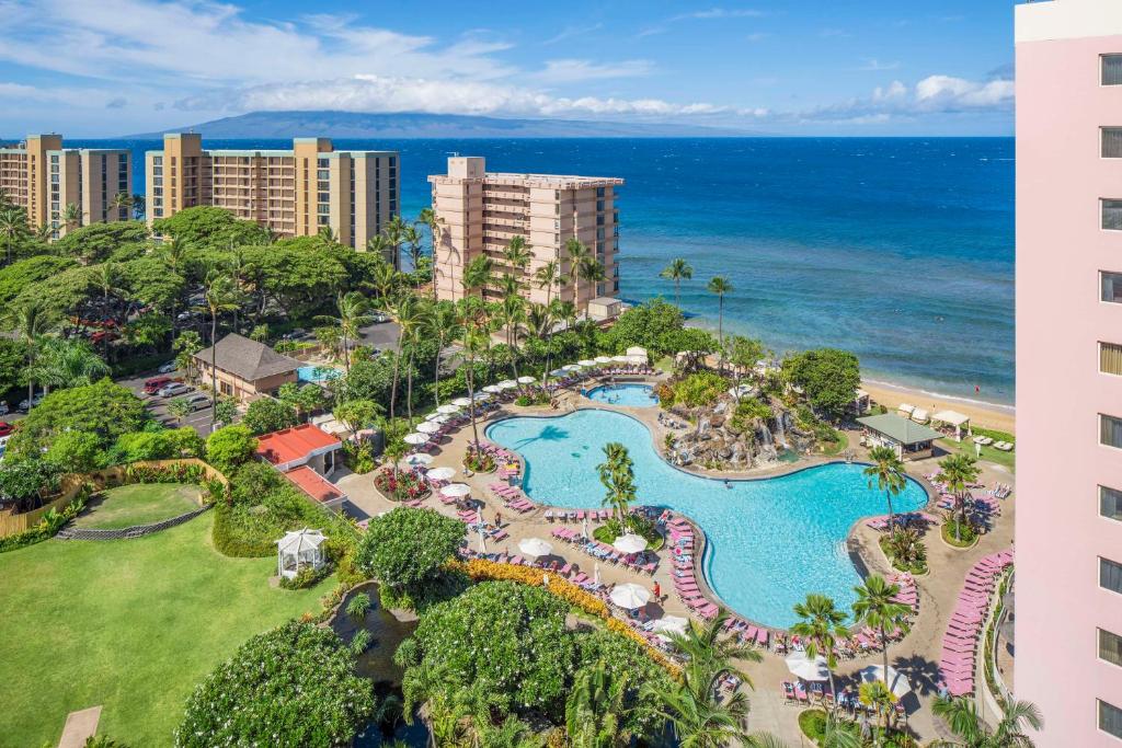 an aerial view of a resort with a pool and the ocean at Hilton Vacation Club Ka'anapali Beach Maui in Lahaina