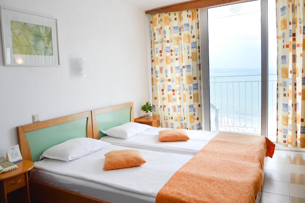 Postel nebo postele na pokoji v ubytování Hotel Elitsa