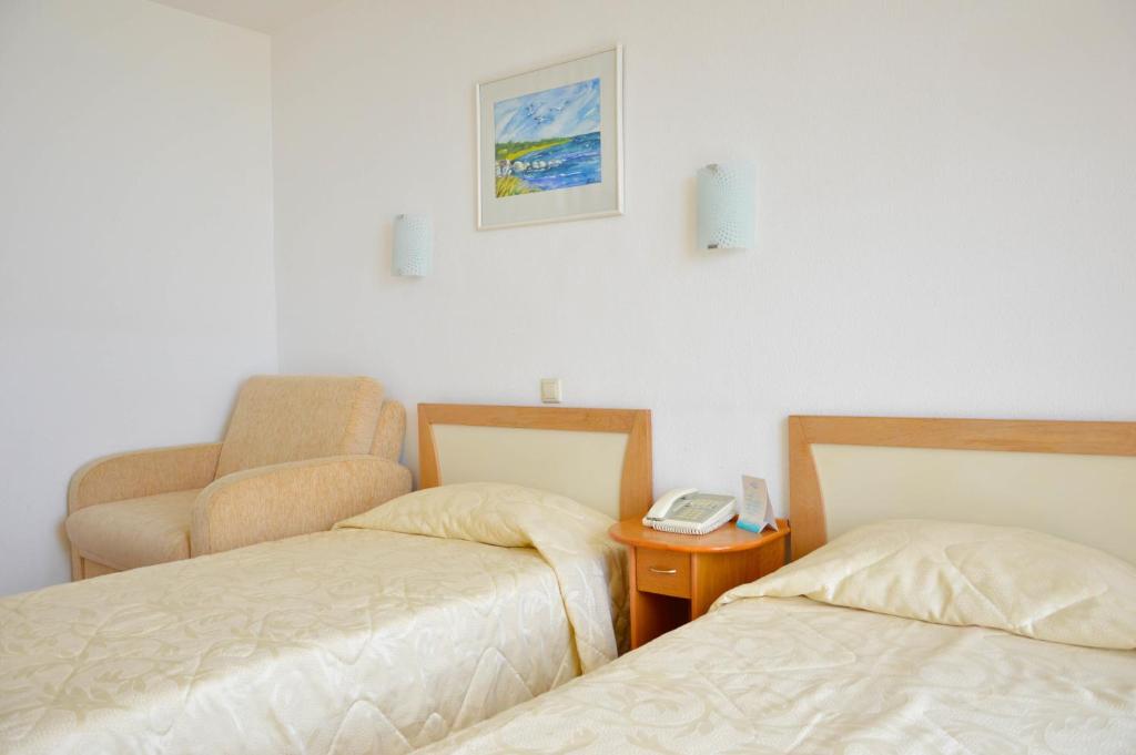 Postel nebo postele na pokoji v ubytování Hotel Elitsa
