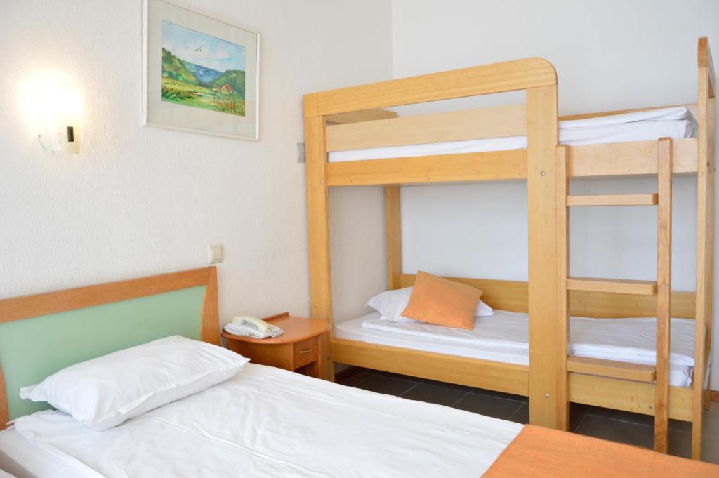 Postel nebo postele na pokoji v ubytování Hotel Elitsa