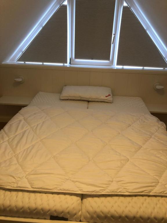 Postel nebo postele na pokoji v ubytování Haus Conwind