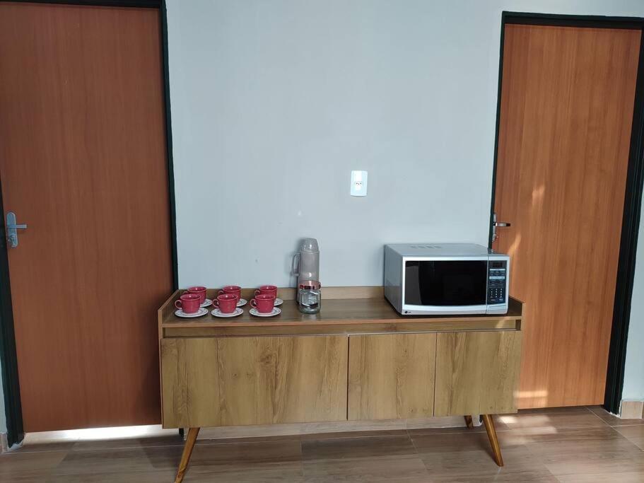Kuchyň nebo kuchyňský kout v ubytování Casa aconchegante