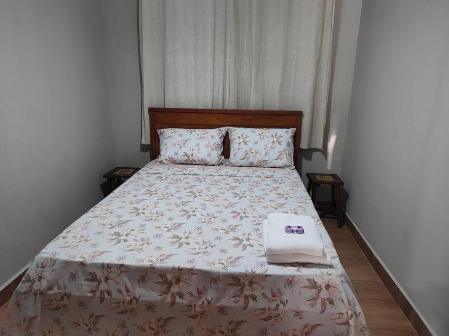 Postel nebo postele na pokoji v ubytování Casa aconchegante