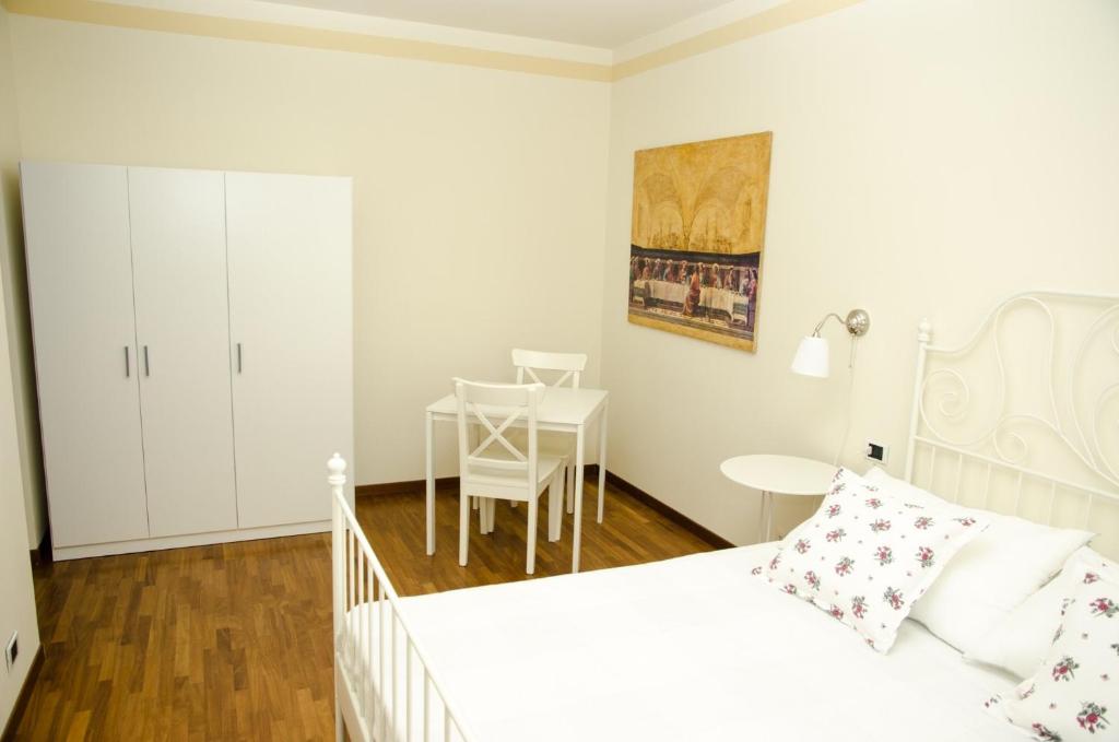 Postel nebo postele na pokoji v ubytování B&B Luc