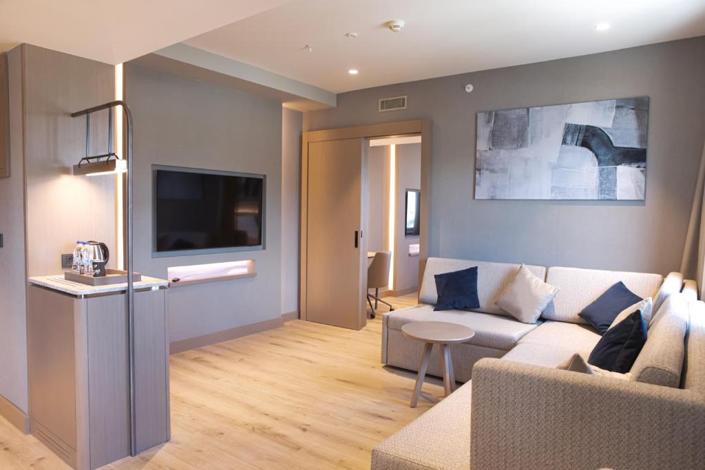 TV a/nebo společenská místnost v ubytování Kolin Hotel Spa & Convention Center
