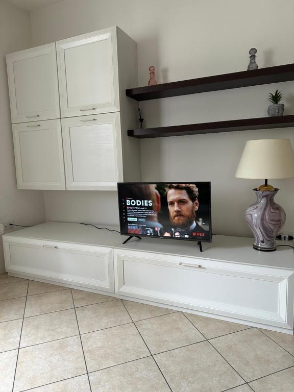 TV a/nebo společenská místnost v ubytování Val di Non Apartment