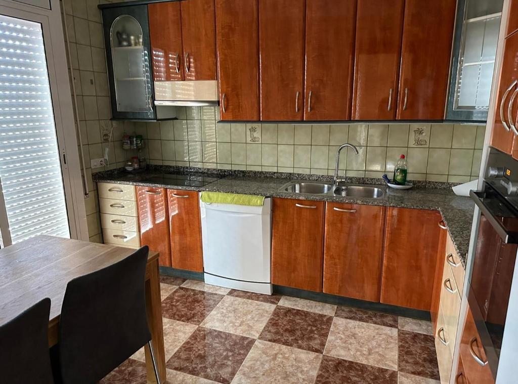 Kuchyň nebo kuchyňský kout v ubytování Apartamento Mallorca Piso de arriba