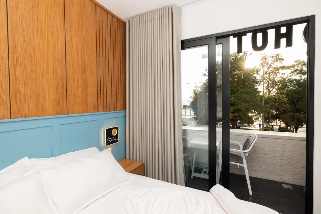 Postel nebo postele na pokoji v ubytování Aglon Twin's Hotel