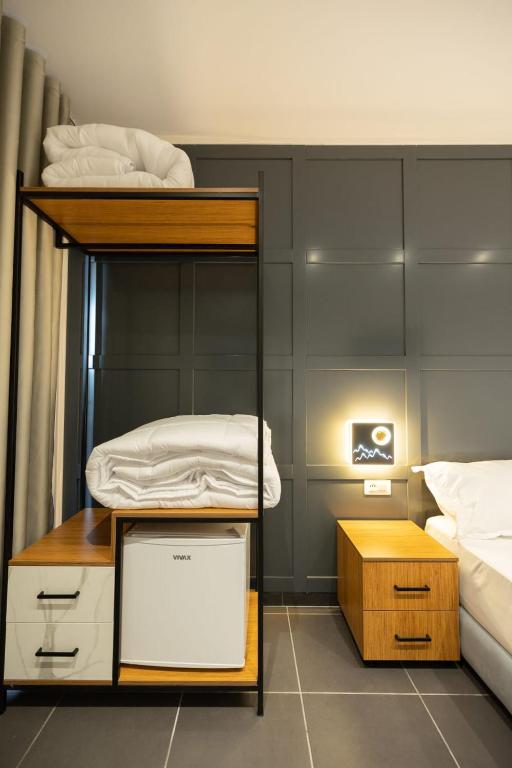 Postel nebo postele na pokoji v ubytování Aglon Twin's Hotel