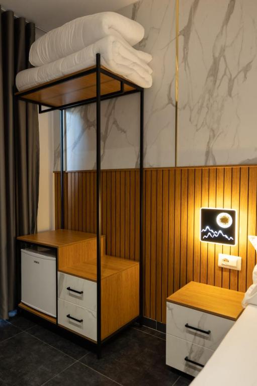 Postel nebo postele na pokoji v ubytování Aglon Twin's Hotel