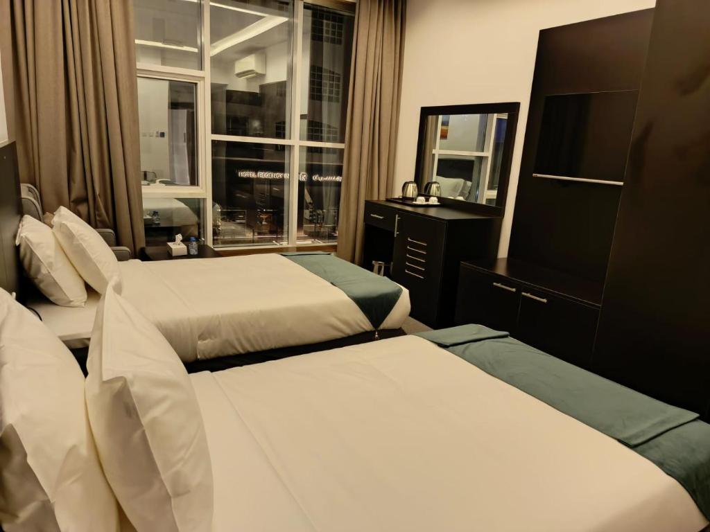 Postel nebo postele na pokoji v ubytování Hill Top Muscat