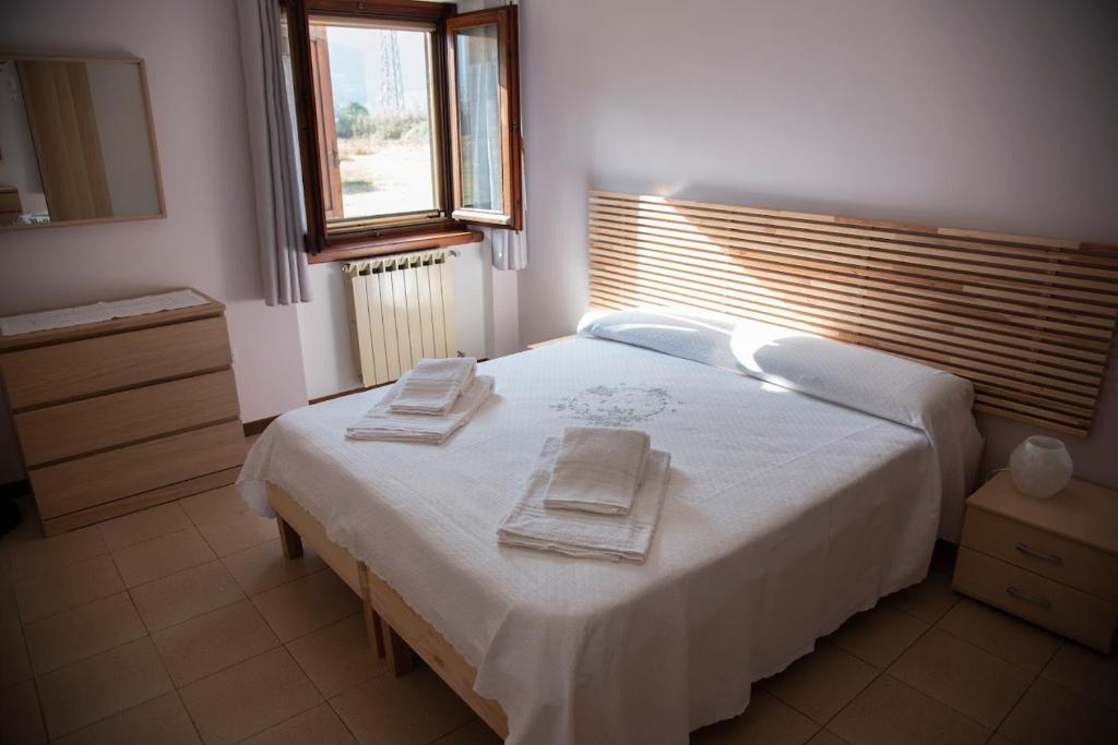 Postel nebo postele na pokoji v ubytování Cascina Pirondini