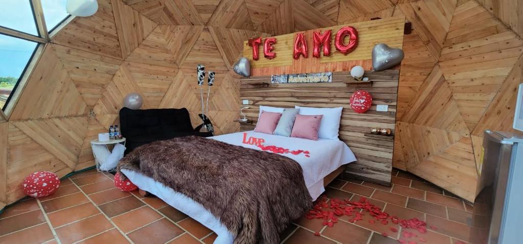 Postelja oz. postelje v sobi nastanitve Glamping Valley Barichara