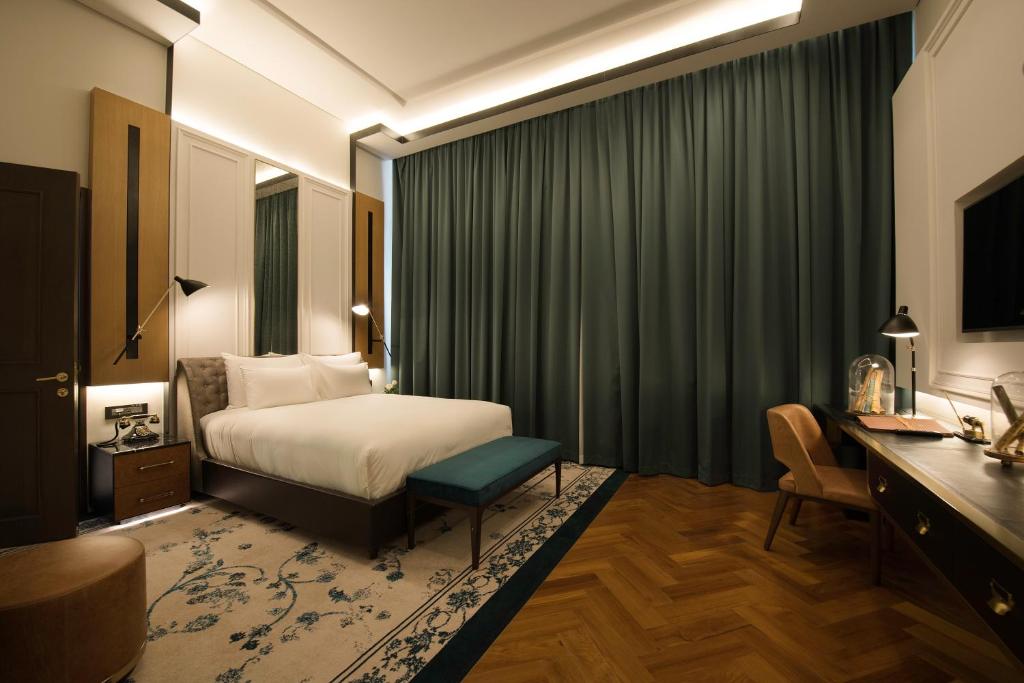 Krevet ili kreveti u jedinici u okviru objekta Yangon Excelsior