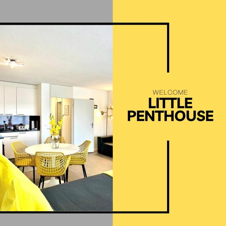a kitchen and a living room with a table and chairs at Little Penthouse **** in Dietikon