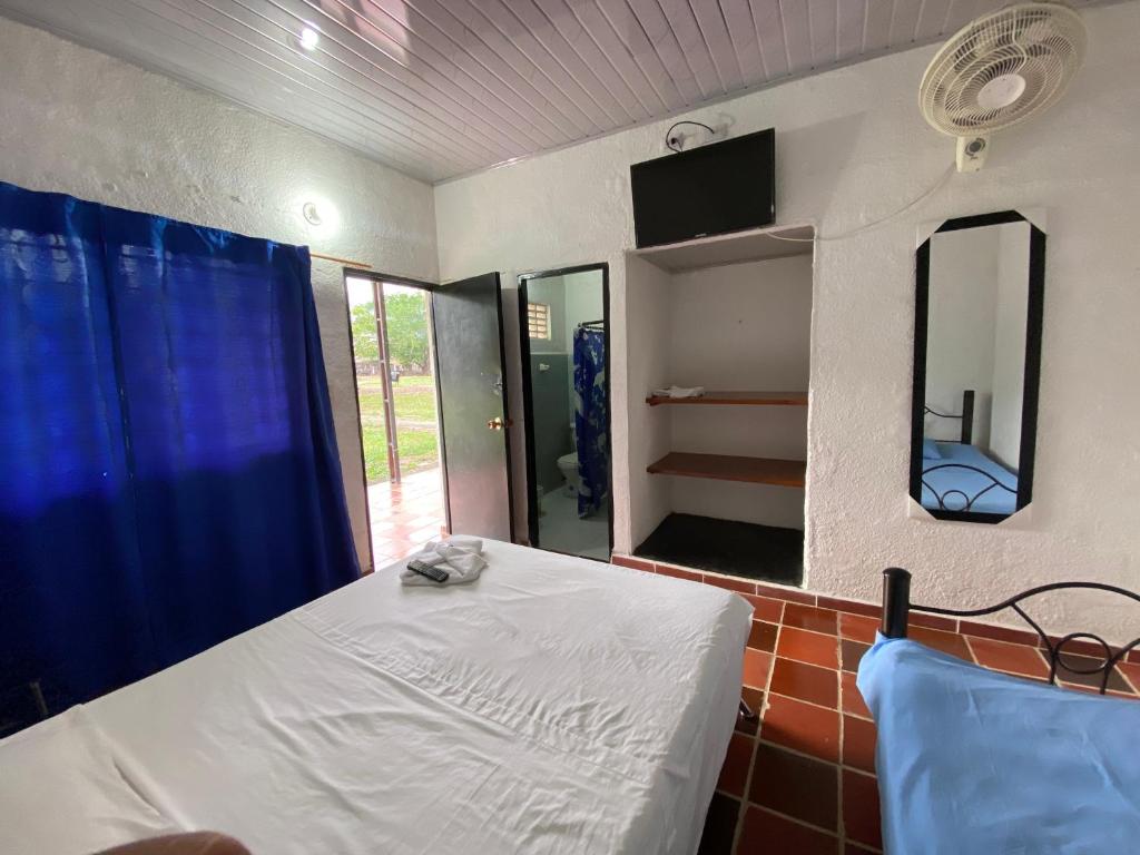 Postel nebo postele na pokoji v ubytování El Palmar
