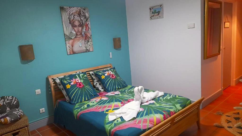 Voodi või voodid majutusasutuse Studio cosy à Saint-François - 21 m² avec balcon et piscine toas