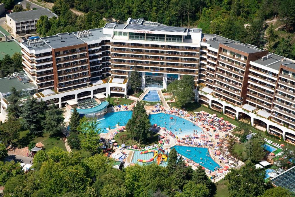 an aerial view of a hotel with a large swimming pool at Flamingo Grand Hotel & Spa in Albena