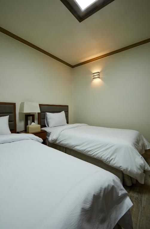 Buan Tree California Hotel - Dwin Room