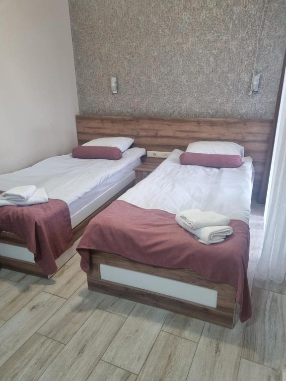 Postel nebo postele na pokoji v ubytování MAHALI HOTEL