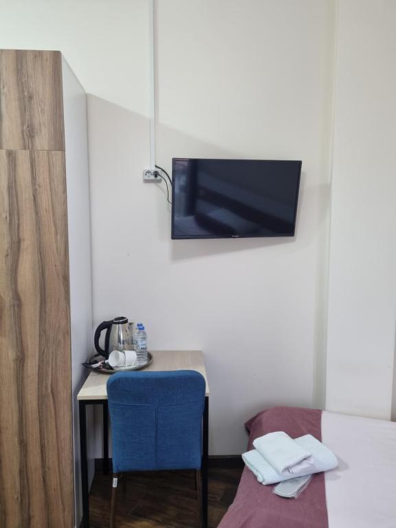 Postel nebo postele na pokoji v ubytování MAHALI HOTEL
