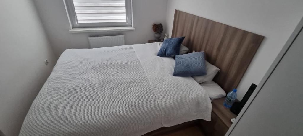 Posteľ alebo postele v izbe v ubytovaní Apartament Dworcowa 30A 14