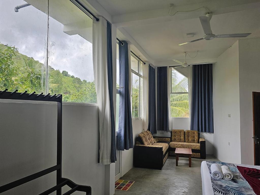Posezení v ubytování Ellakanda Nature Villa