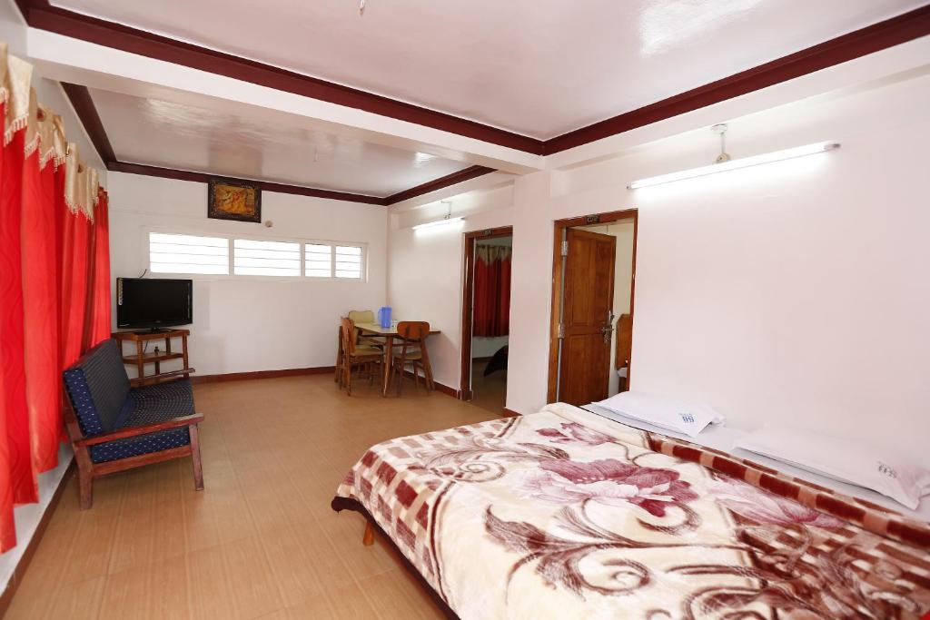 Postel nebo postele na pokoji v ubytování Hotel Sri Balaji