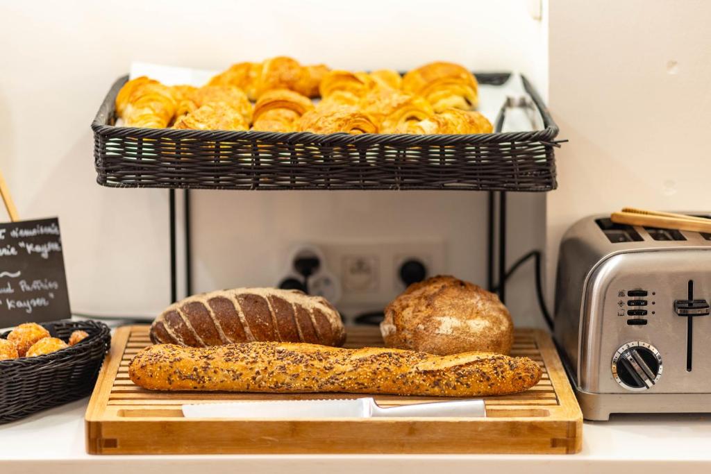 Hôtel La Parizienne - Proche Montparnasse - Resim 10