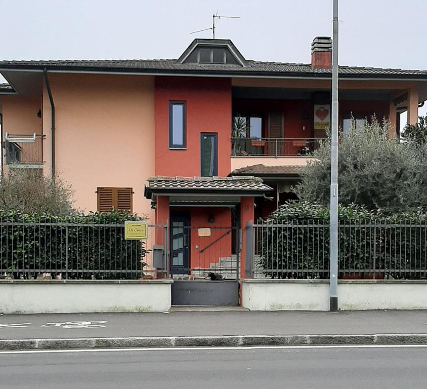a house on the side of a street at Casa vacanze da Cinzia in Zanica