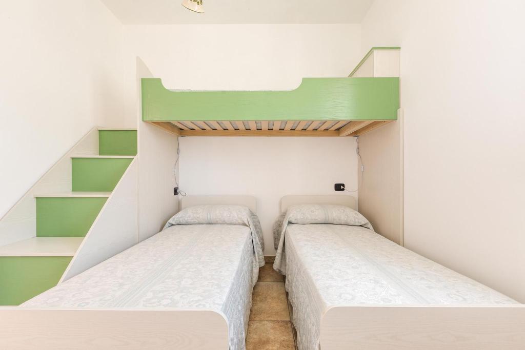Postel nebo postele na pokoji v ubytování Salentoandmore - Villa La Macchia