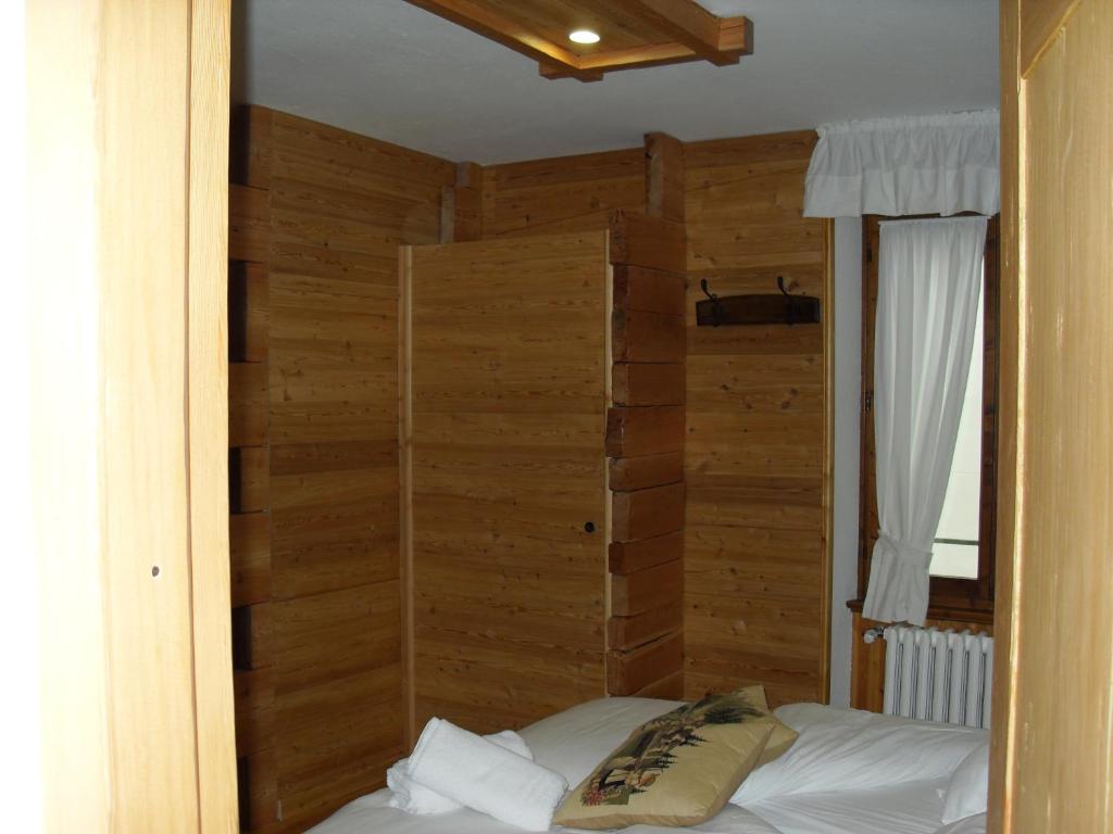 Postel nebo postele na pokoji v ubytování Hotel Capriolo