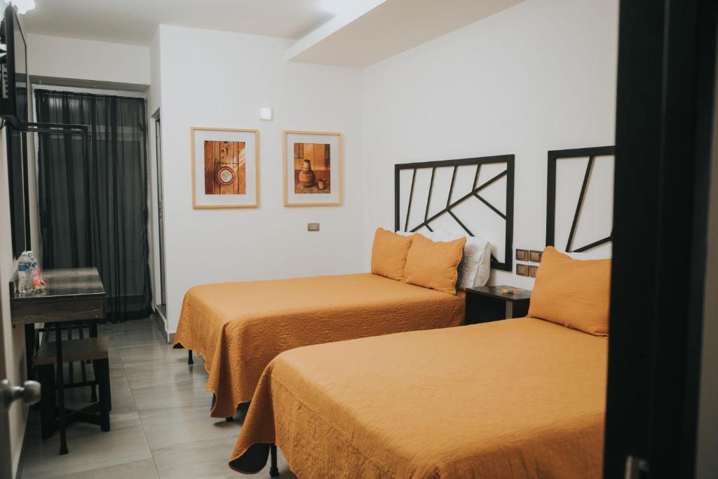 Postel nebo postele na pokoji v ubytování MCI HOTEL