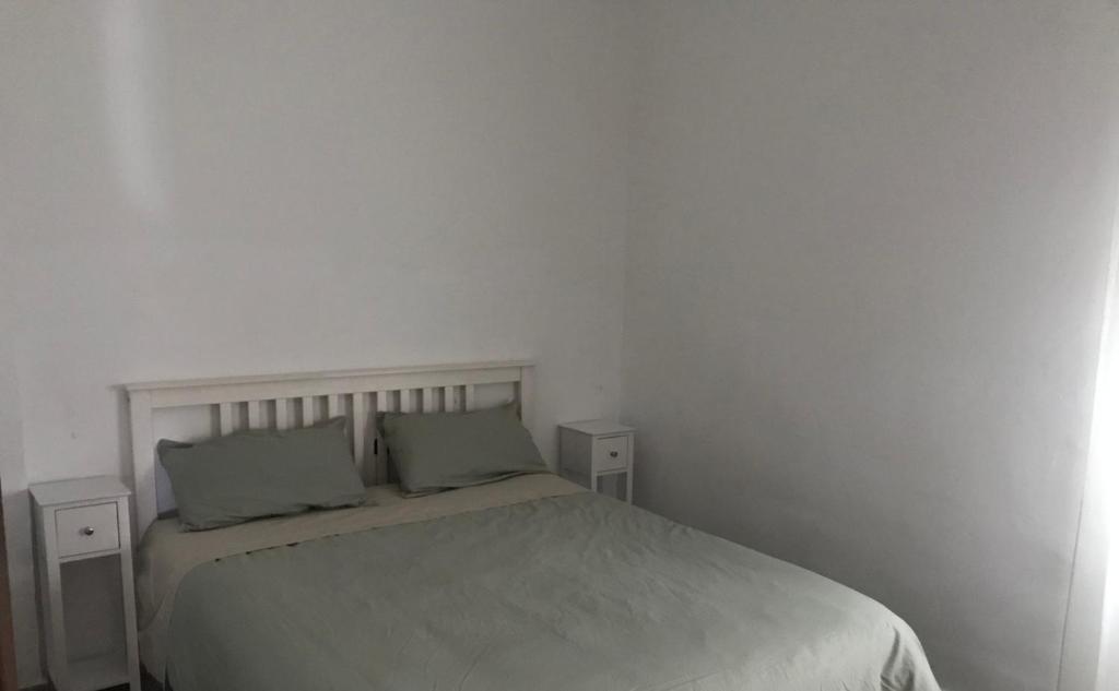 Postel nebo postele na pokoji v ubytování El Chalet de Lola