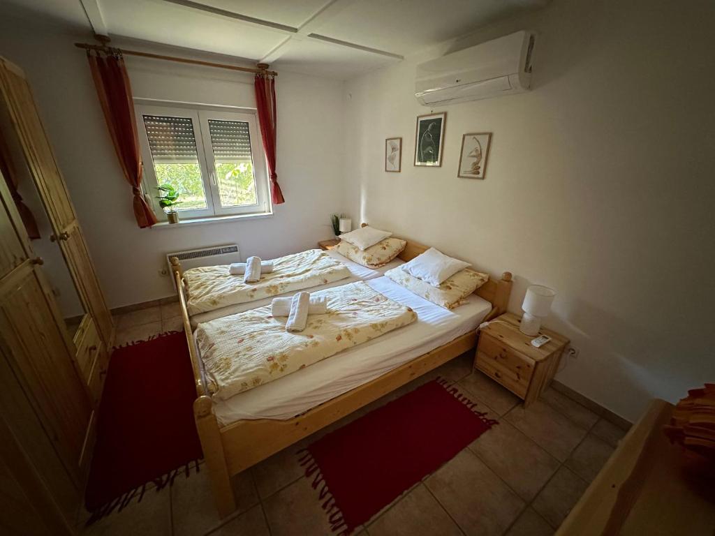 Postel nebo postele na pokoji v ubytování Regina Ranch