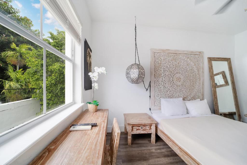 Postel nebo postele na pokoji v ubytování Treehouse Hotel