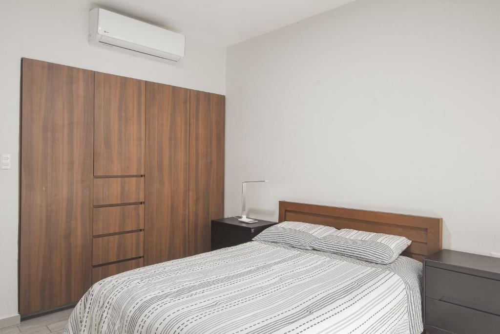 Postel nebo postele na pokoji v ubytování Departamento Punta Rio Cerca del Mar