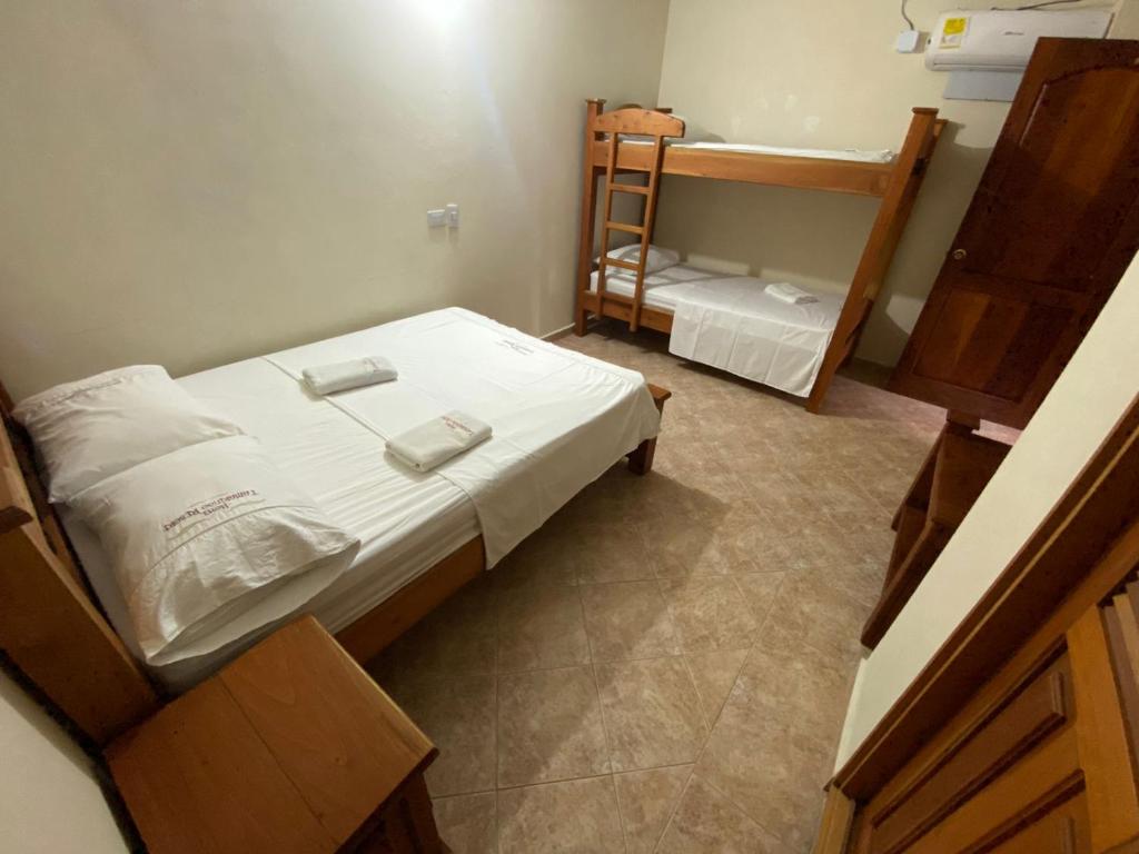 Postel nebo postele na pokoji v ubytování Hotel Tamarindo Resort
