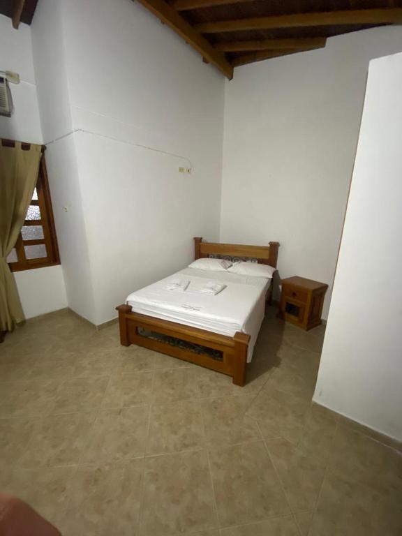Postel nebo postele na pokoji v ubytování Hotel Tamarindo Resort