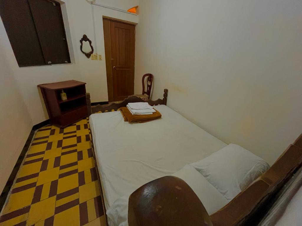Postel nebo postele na pokoji v ubytování Casa Grande Hostal