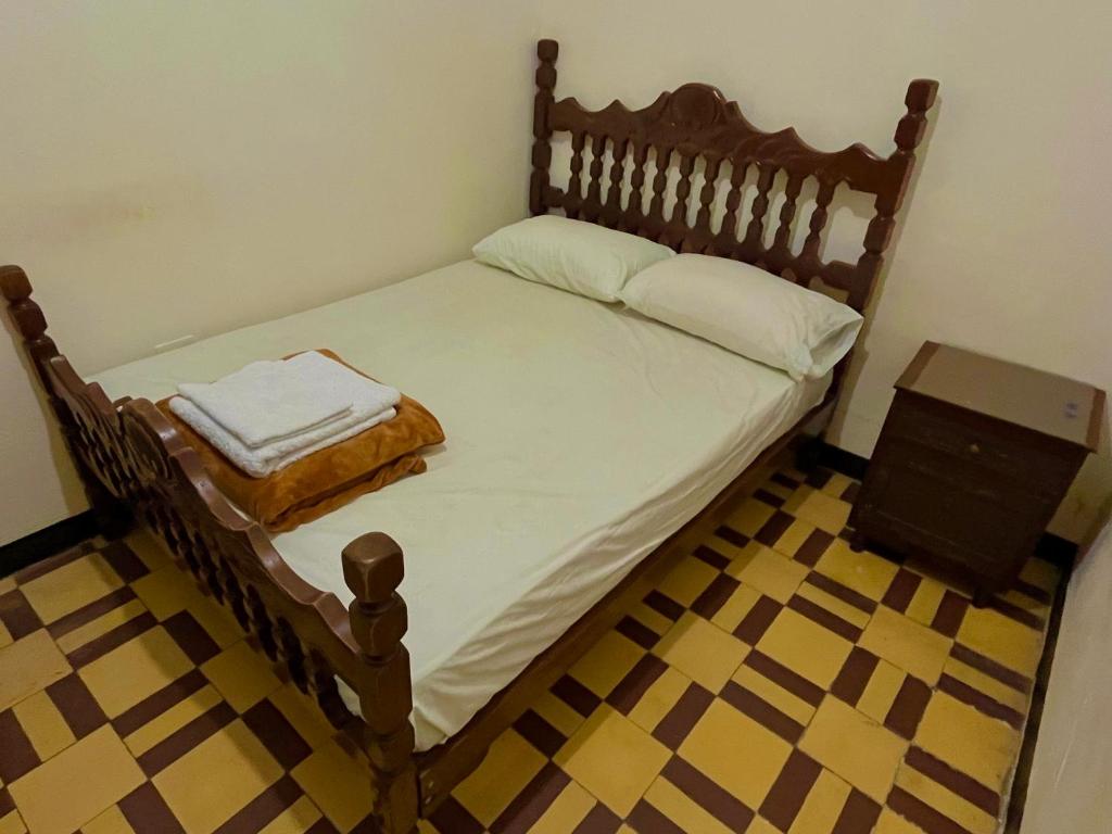 Postel nebo postele na pokoji v ubytování Casa Grande Hostal