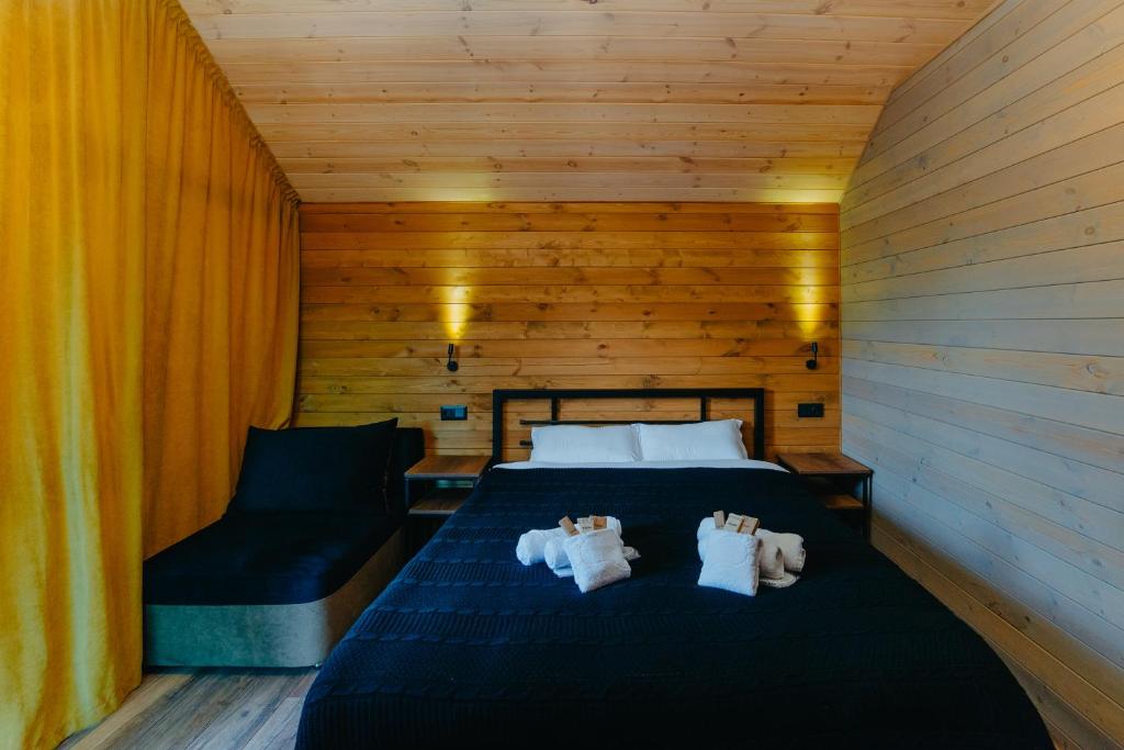 Postel nebo postele na pokoji v ubytování wanderholic